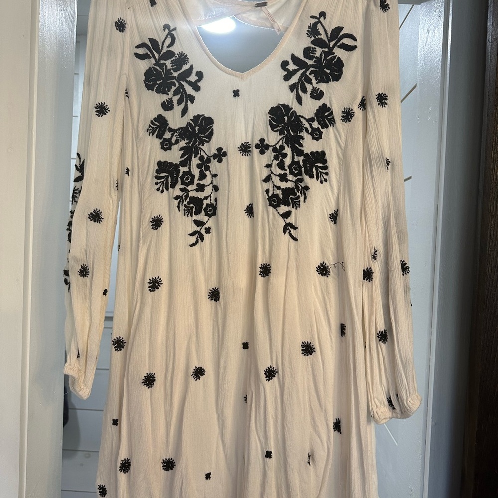 Elegant White Dress with Black Floral Embroidery